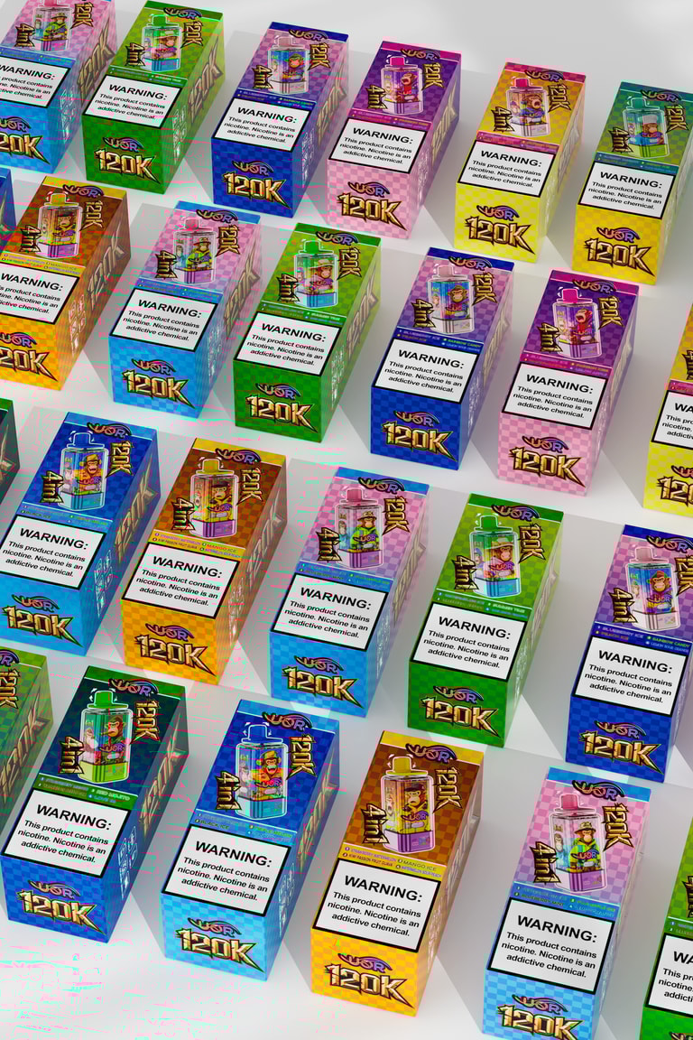 Rows of bright, pastel-colored vape juice boxes arranged in a grid, each featuring a small bottle illustration, a bold 120K graphic, and a front warning label about nicotine as an addictive chemical.